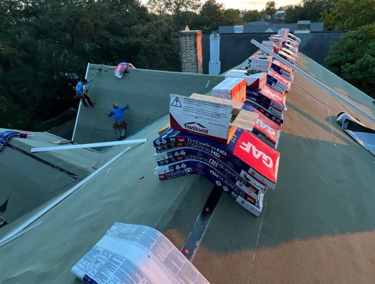 Roofer installing a residential roof in Williamson County, TX